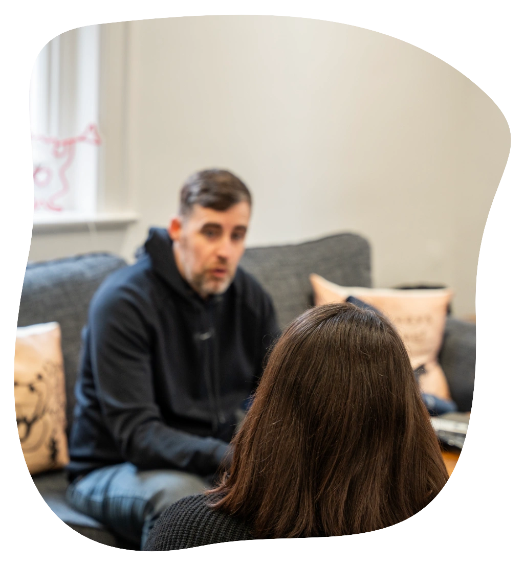 Sarah talking to a client